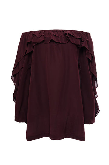 The Double Ruffle Silk Top in burgundy.