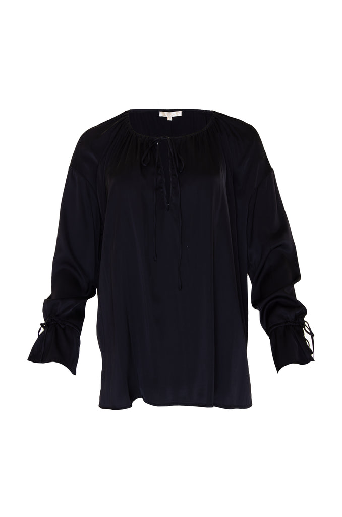 The Pleasant Wrap Front Tie Top in black.